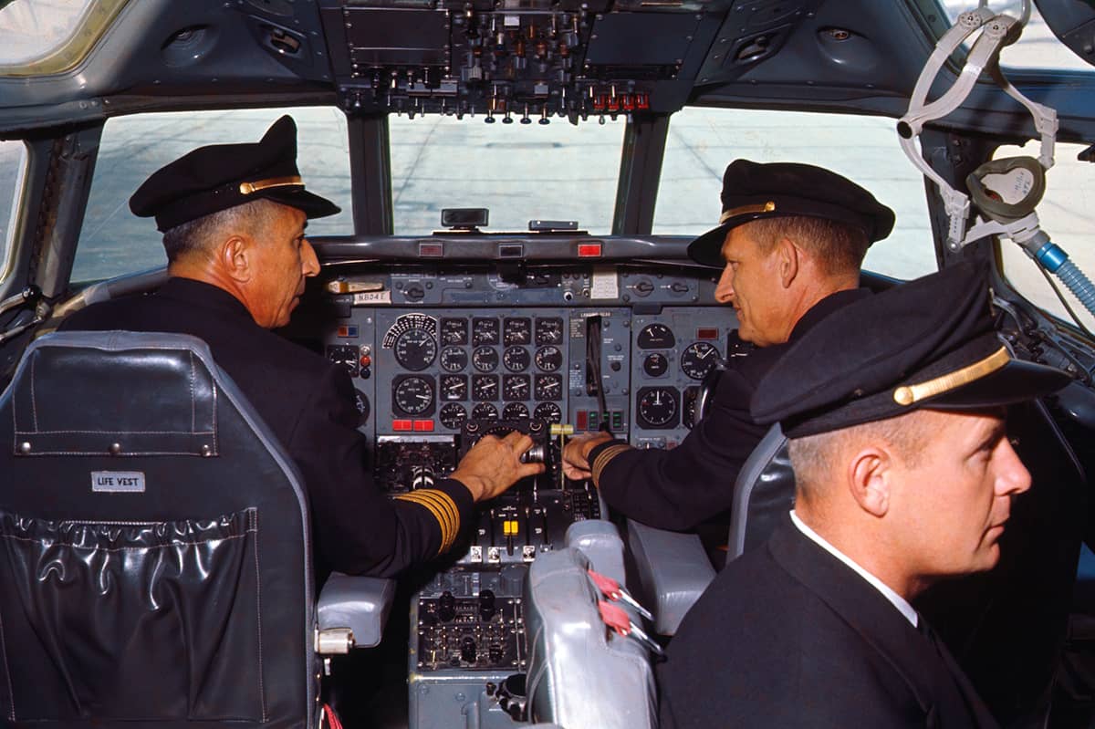 DC-8 cockpit with pilots